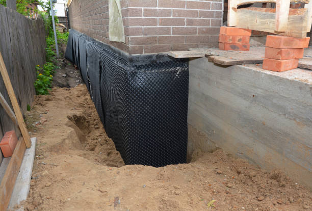 SJ Waterproofing Pros technician performing targeted Emergency Waterproofing assessment in Washington, GA